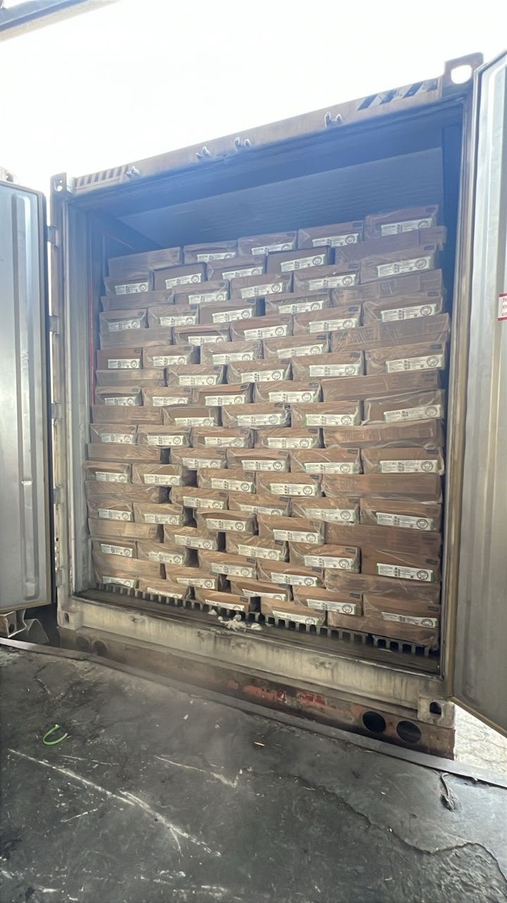 Quality Foods S.A. container loaded with product