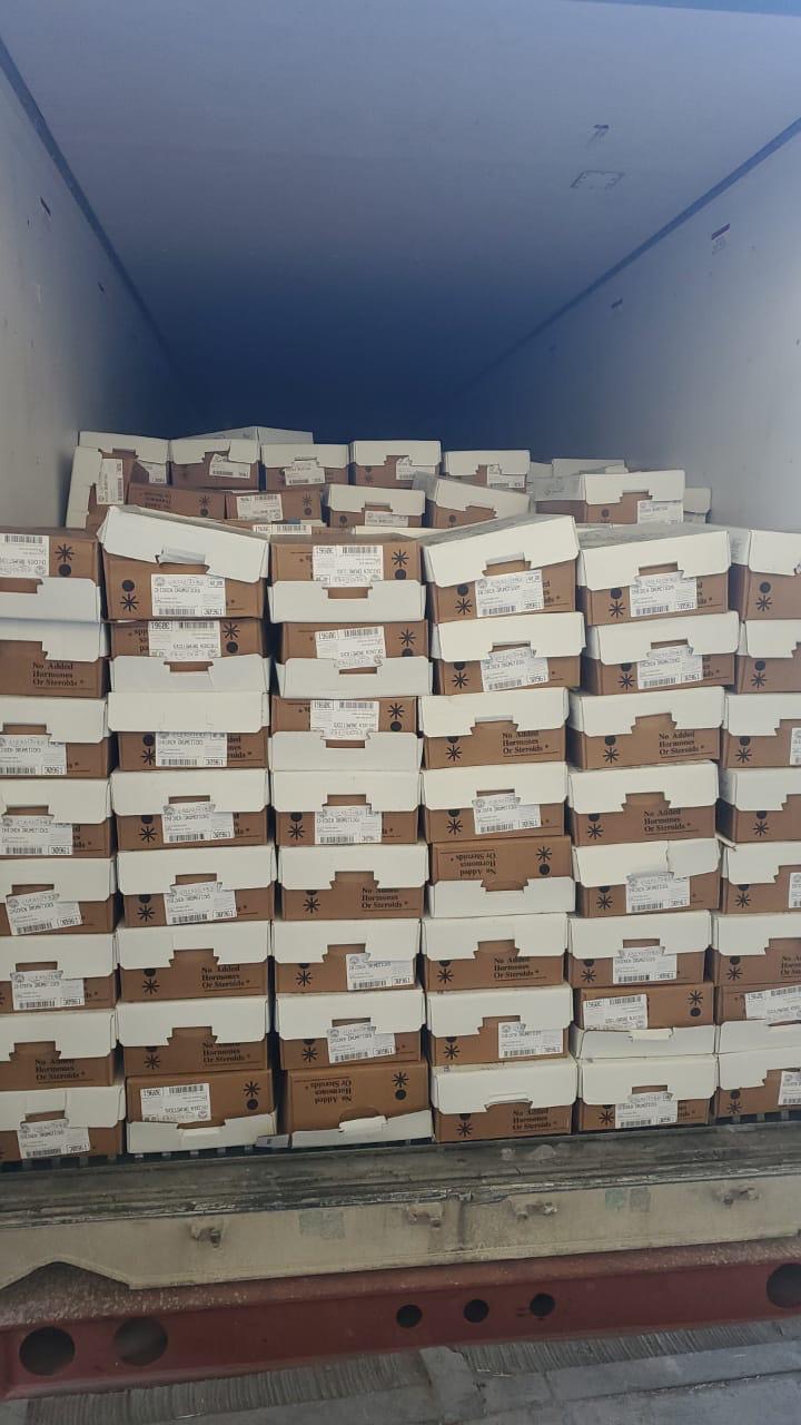 Quality Foods S.A. container loaded with product