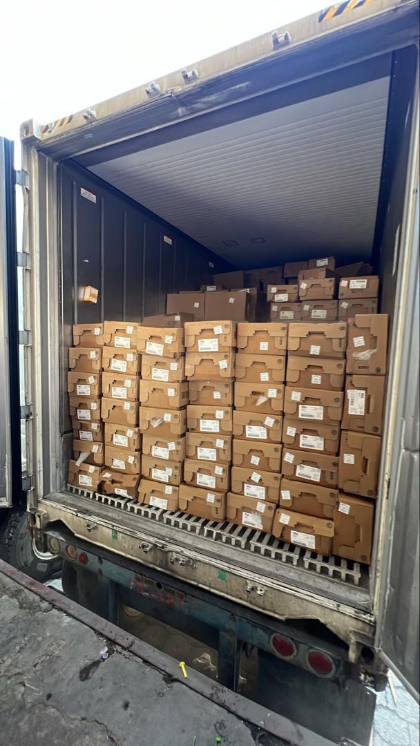 Quality Foods S.A. container loaded with product